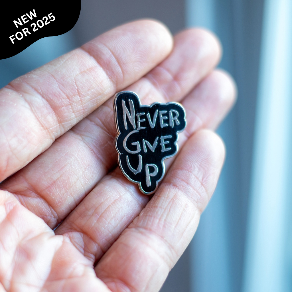 "Never Give Up" Pin