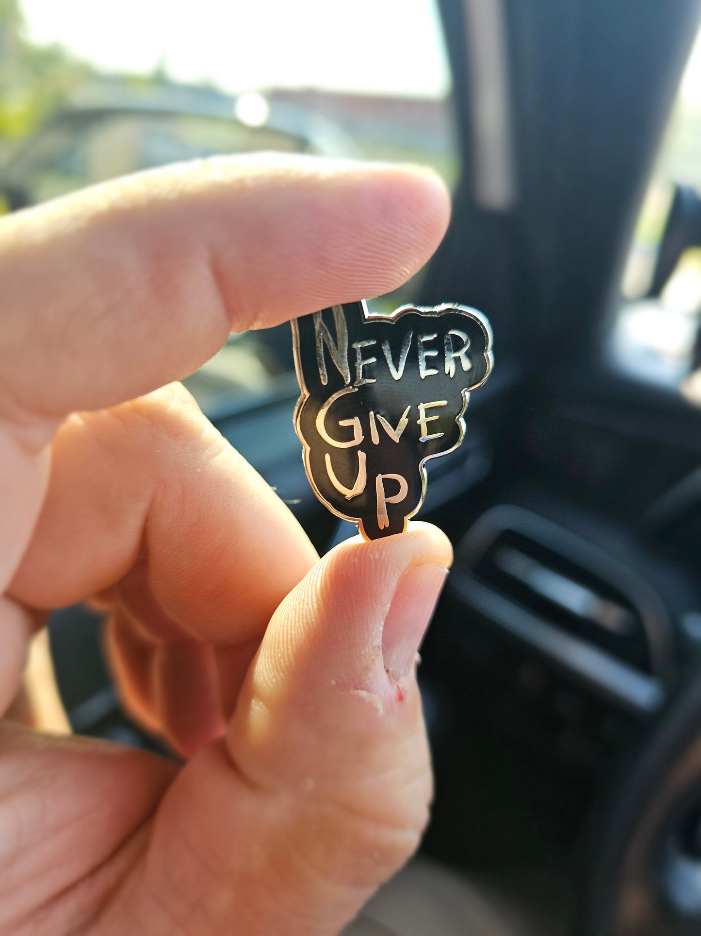 NEW 2024 (Pre-Sale) "Never Give Up" Pin - Black and Chrome